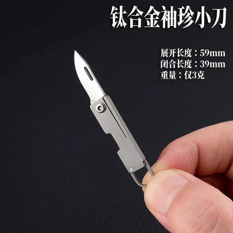 Titanium alloy pocket knife with sharp folding edge, portable keychain pendant, unboxing and unpacking, express knife by DarkByteGear
