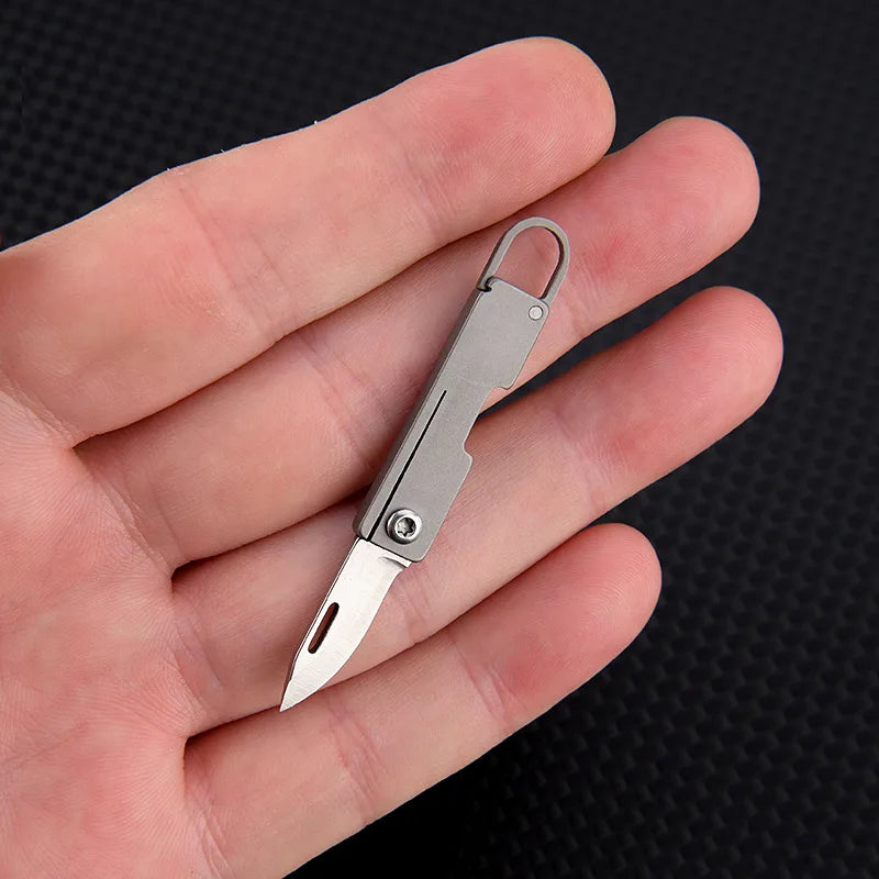Titanium alloy pocket knife with sharp folding edge, portable keychain pendant, unboxing and unpacking, express knife by DarkByteGear