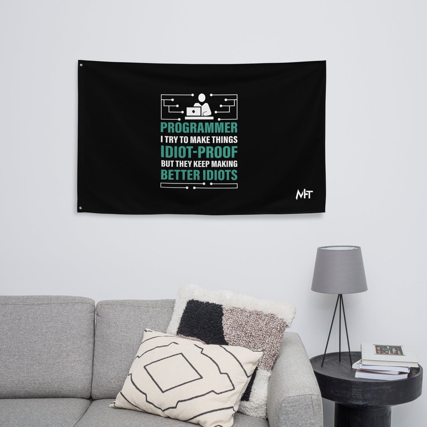 Programmer: I Try to Make things idiot-proof, but they Keep making better idiot - Flag by DarkByteGear