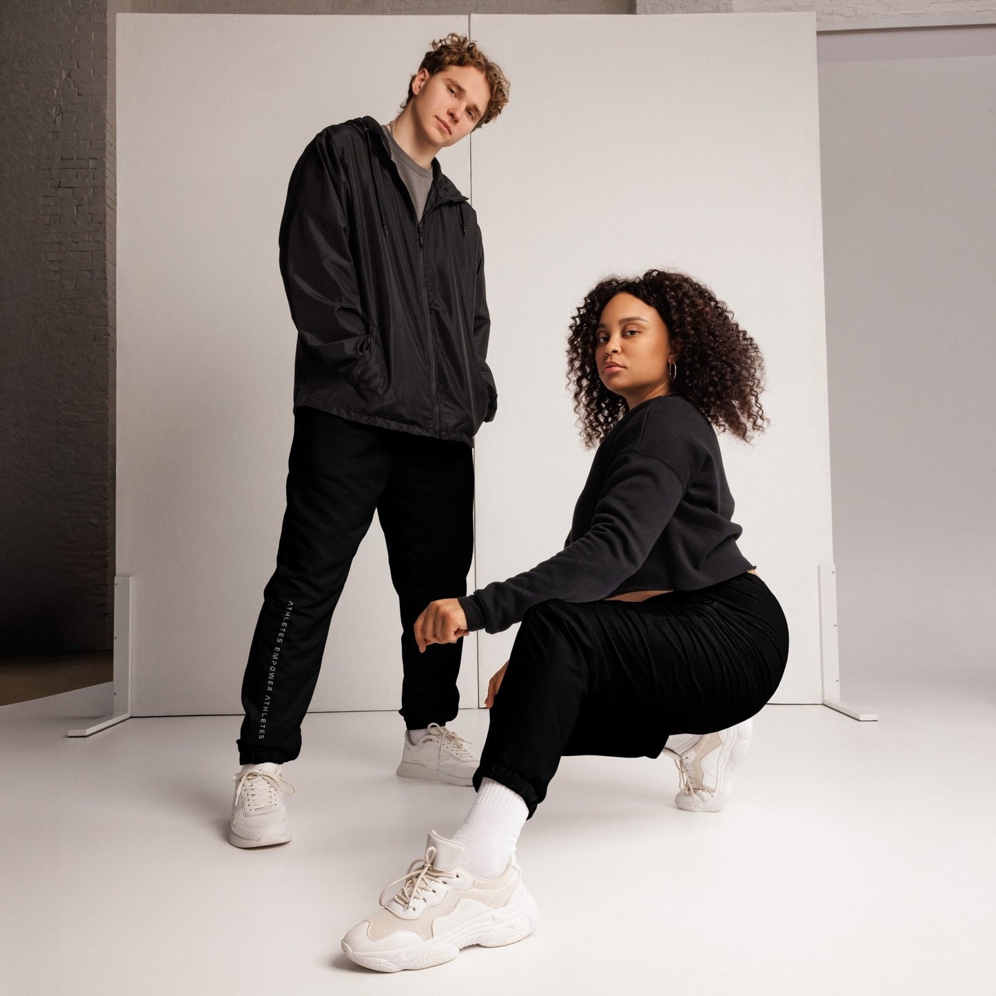 Athletes Empower Athletes - Unisex track pants by DarkByteGear