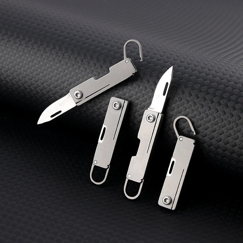 Titanium alloy pocket knife with sharp folding edge, portable keychain pendant, unboxing and unpacking, express knife by DarkByteGear
