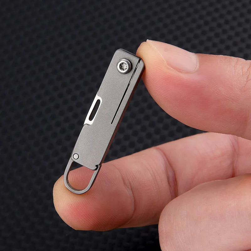 Titanium alloy pocket knife with sharp folding edge, portable keychain pendant, unboxing and unpacking, express knife by DarkByteGear