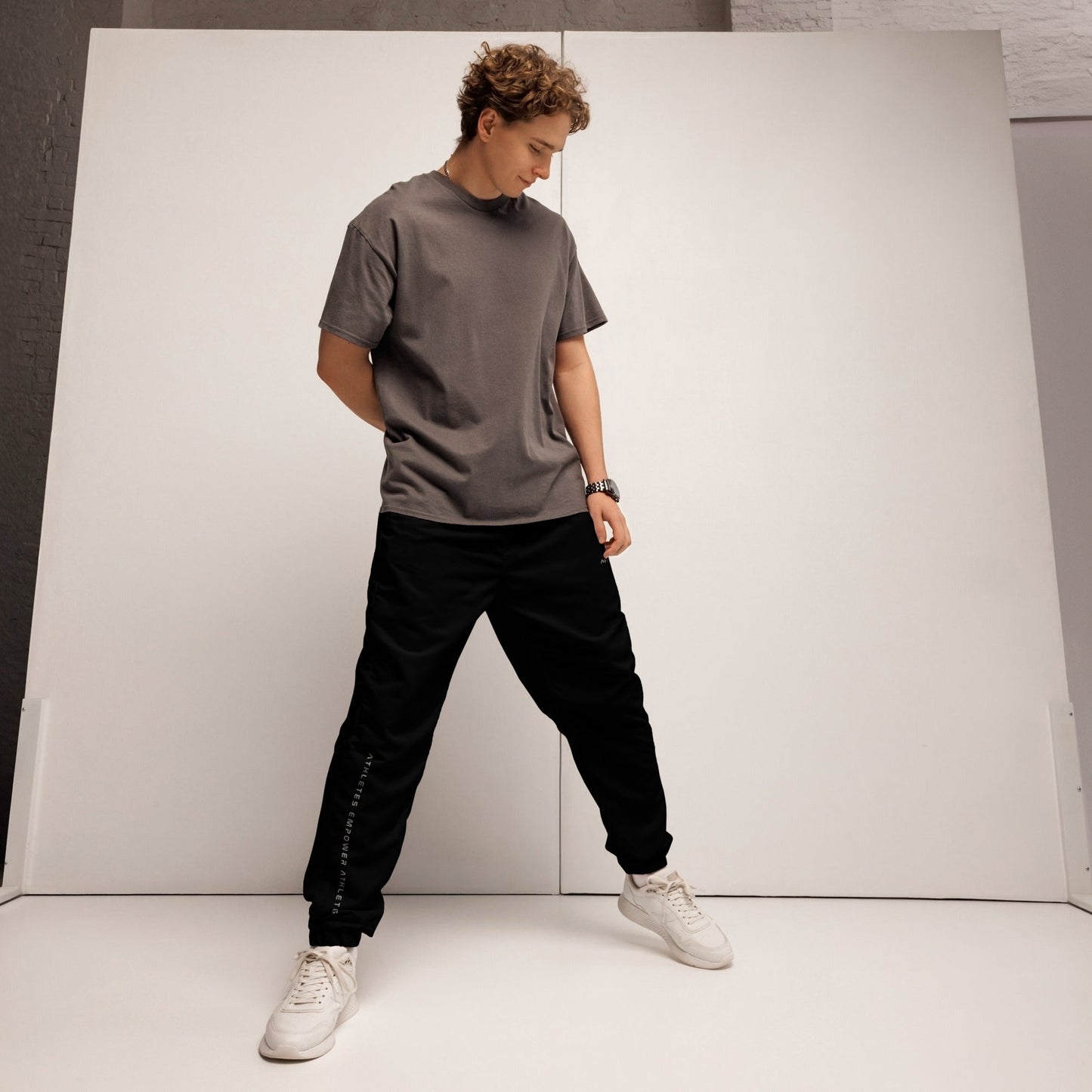 Athletes Empower Athletes - Unisex track pants by DarkByteGear