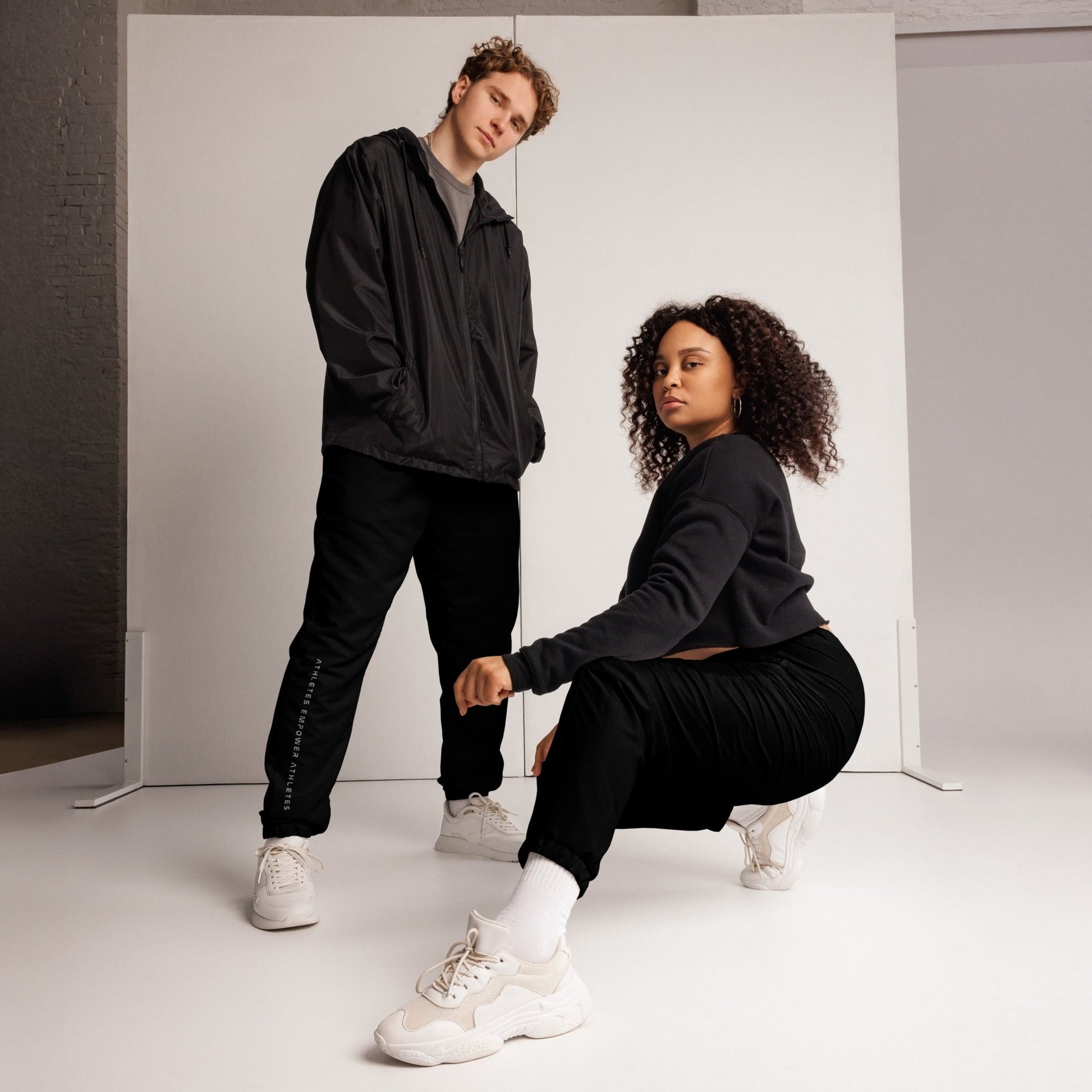 Athletes Empower Athletes - Unisex track pants by DarkByteGear