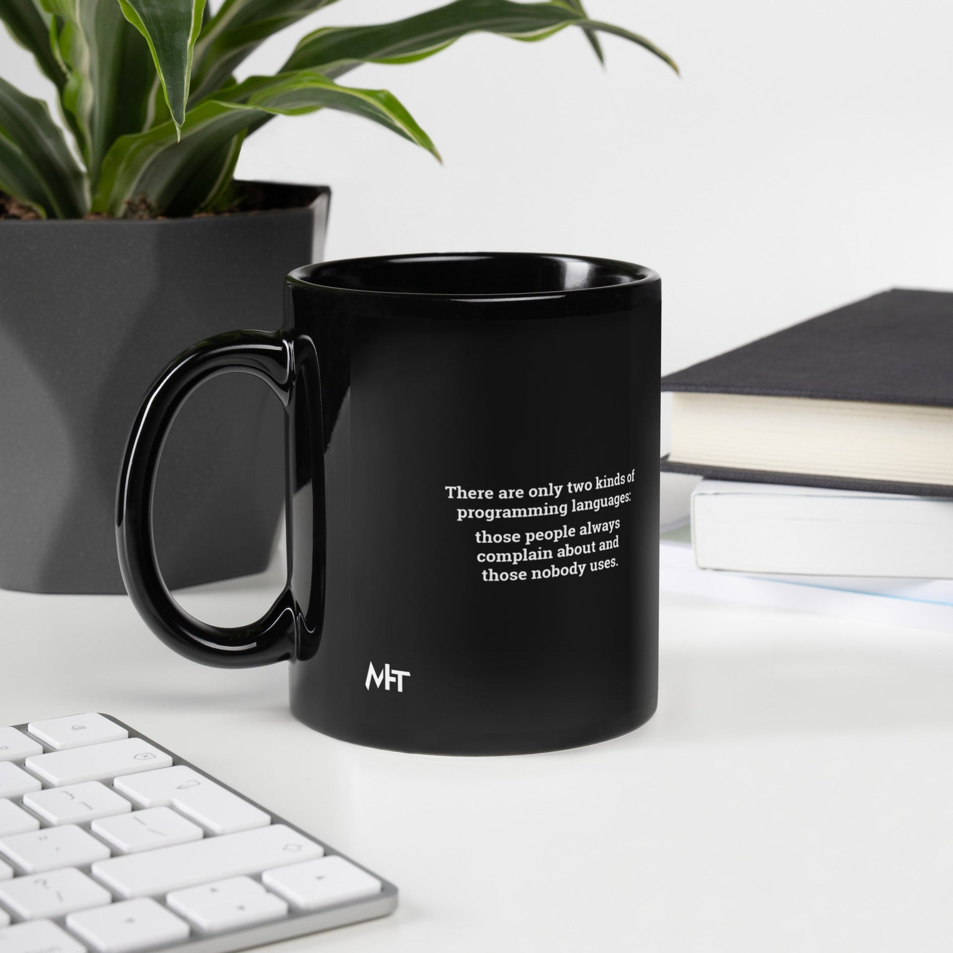 There are only two kinds of programming languages those people always complain about and those nobody uses - Black Glossy Mug by DarkByteGear