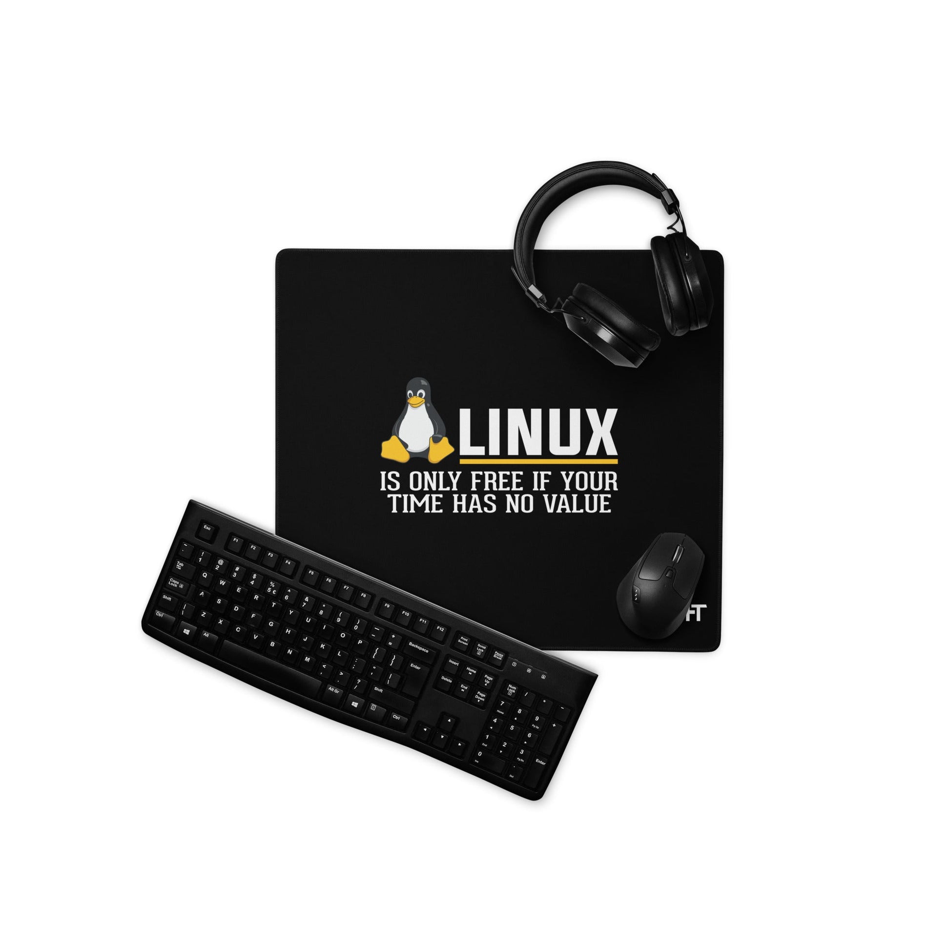 Linux is free only when your time has no value Desk Mat by DarkByteGear